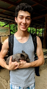 Nazifi gets to know one of the inhabitants of Longo Mai, a village known for its environmental awareness. Nazifi gets to know one of the inhabitants of Longo Mai, a village known for its environmental awareness.